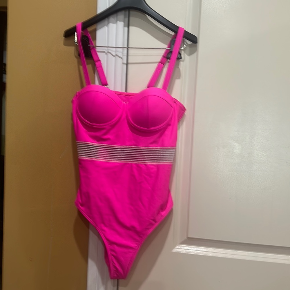 Beautiful bathing suit in new condition, never worn.  Beautiful design.